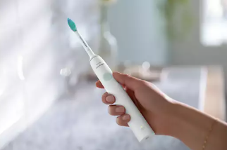 Ergonomic design makes the toothbrush easy to hold and use